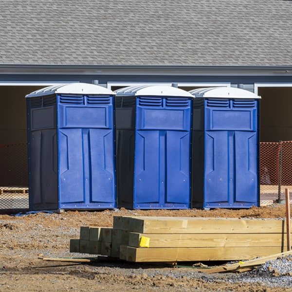 what is the cost difference between standard and deluxe portable restroom rentals in Pilot Point Texas